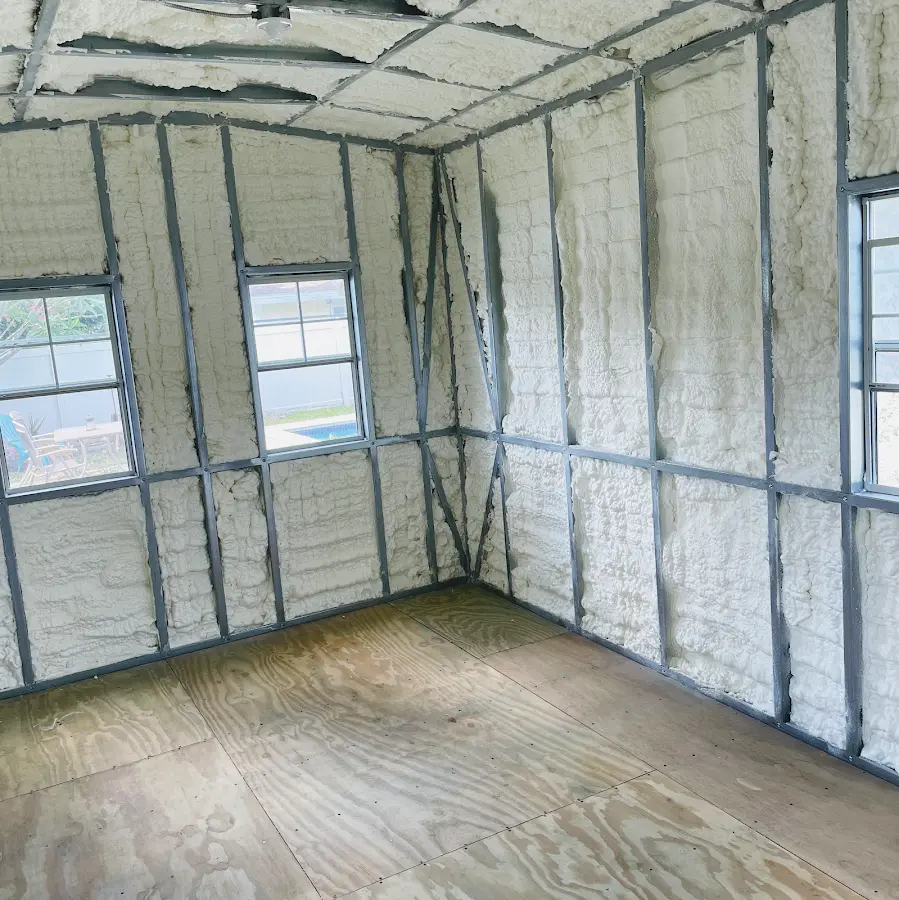Closed-cell spray foam insulation applied to wall cavities in a residential project in Hendersonville